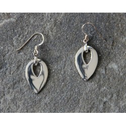 A pair of inverted pear-shaped dropped sterling silver earrings